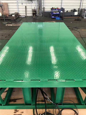 Green Electric Telescopic Dock Leveler Built In Warehouses Loading Bay For Safest Unloading